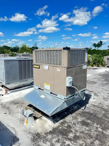 Commercial rooftop packaged HVAC unit mounted on a roof curb