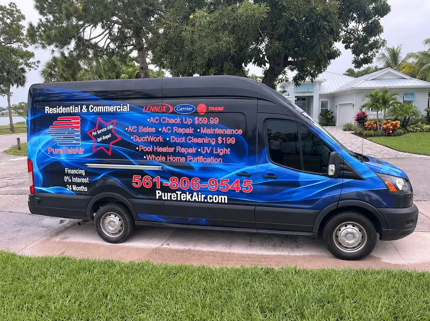 PureTek Air branded service van parked in a Florida neighborhood
